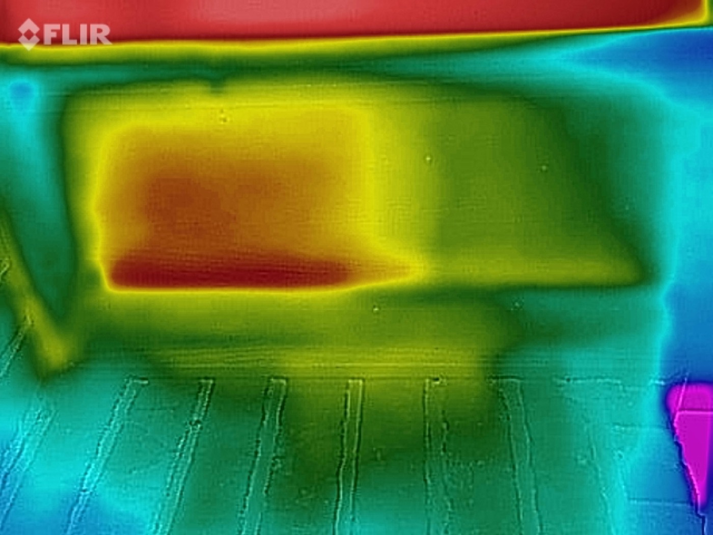Thermal image showing honey bee activity inside a soffit